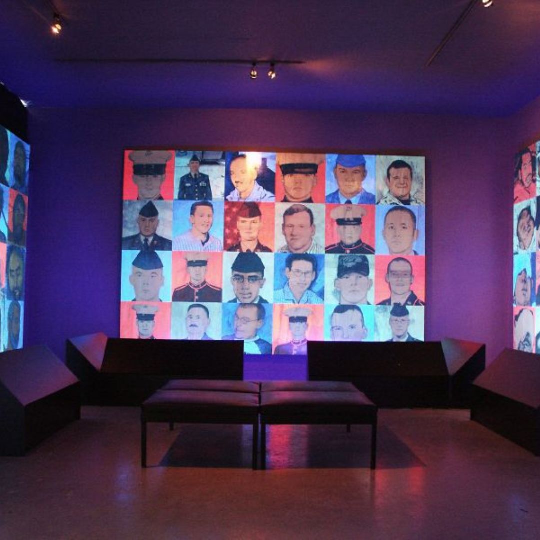 Photo of exhibit at Tett Centre location showcasing "A Vast Metabolism" exhibit in pink lighting.